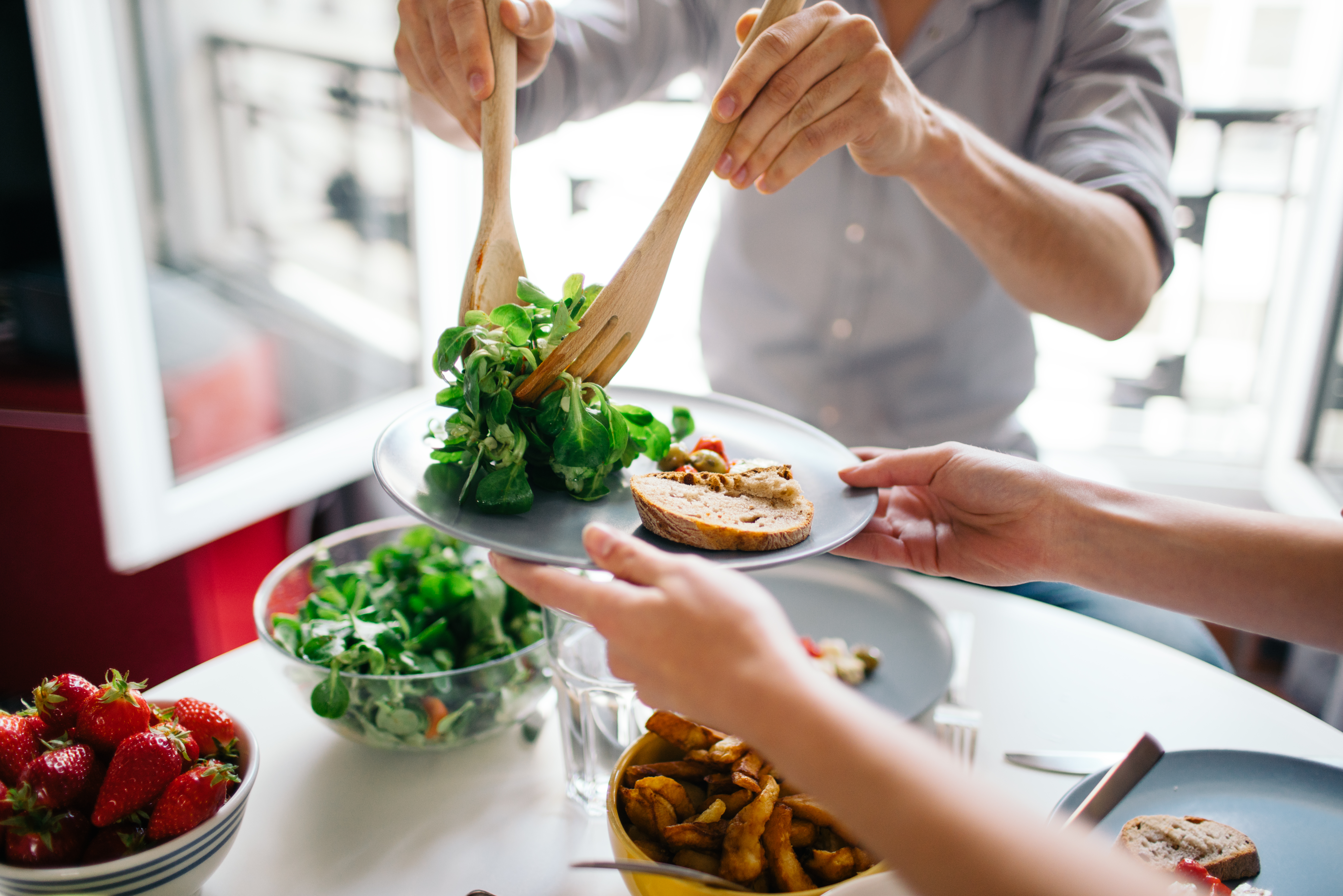 Couple serving a healthy meal